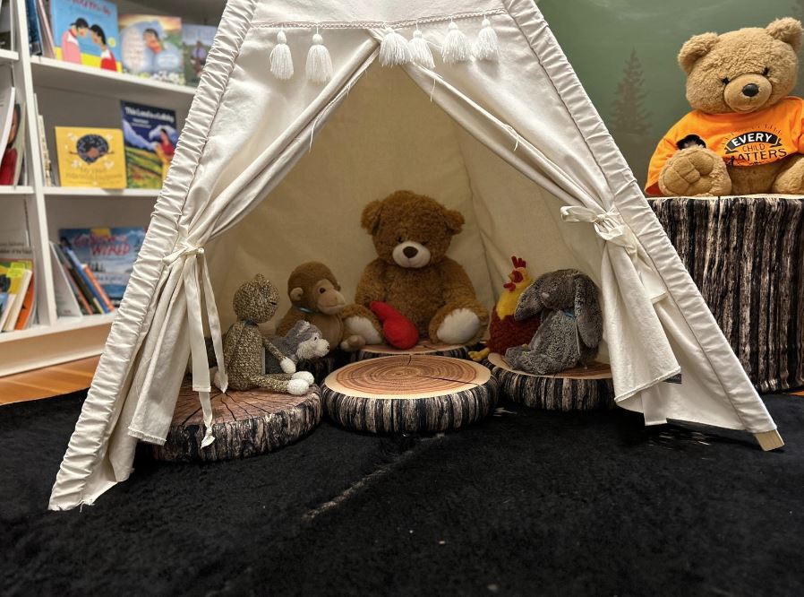stuffies sleeping over at the Little Red Reading House